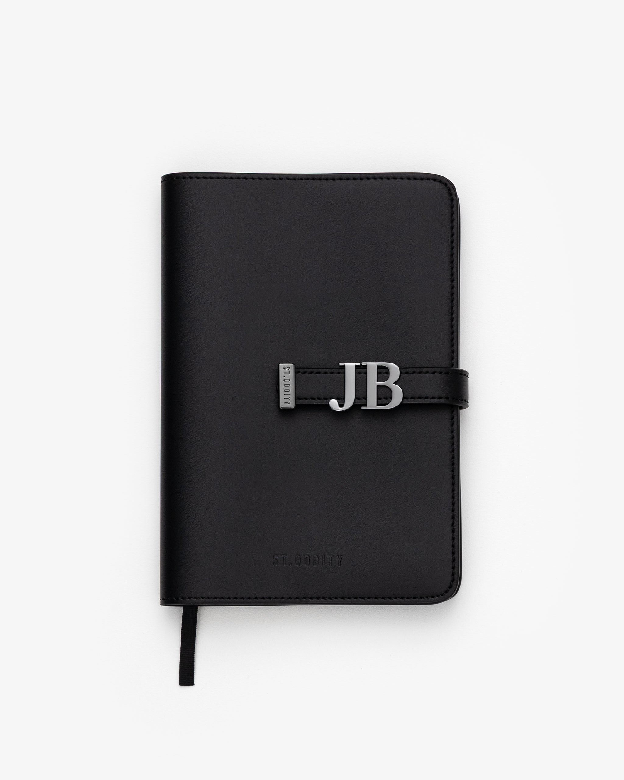 Black notebook with gunmetal personalisation 'JB' on a white background