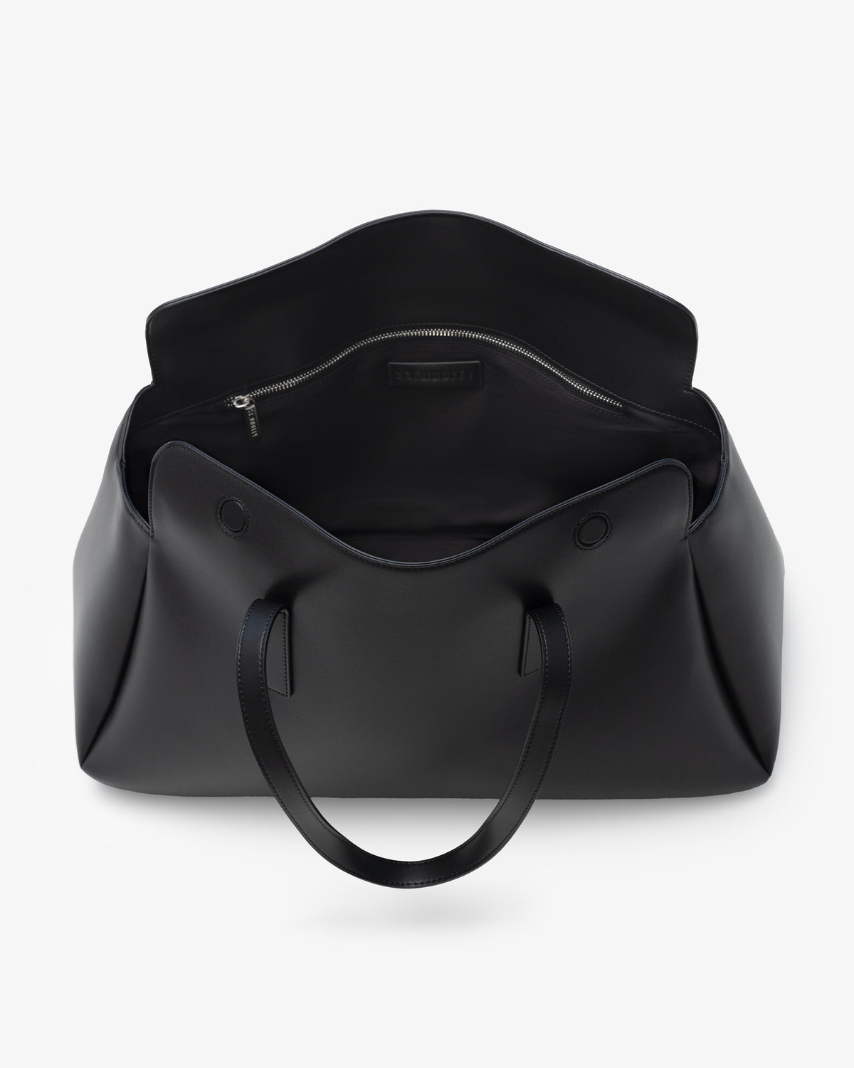 A black leather tote bag shown from a top-down view, open to reveal a zippered interior compartment, set against a clean white background.