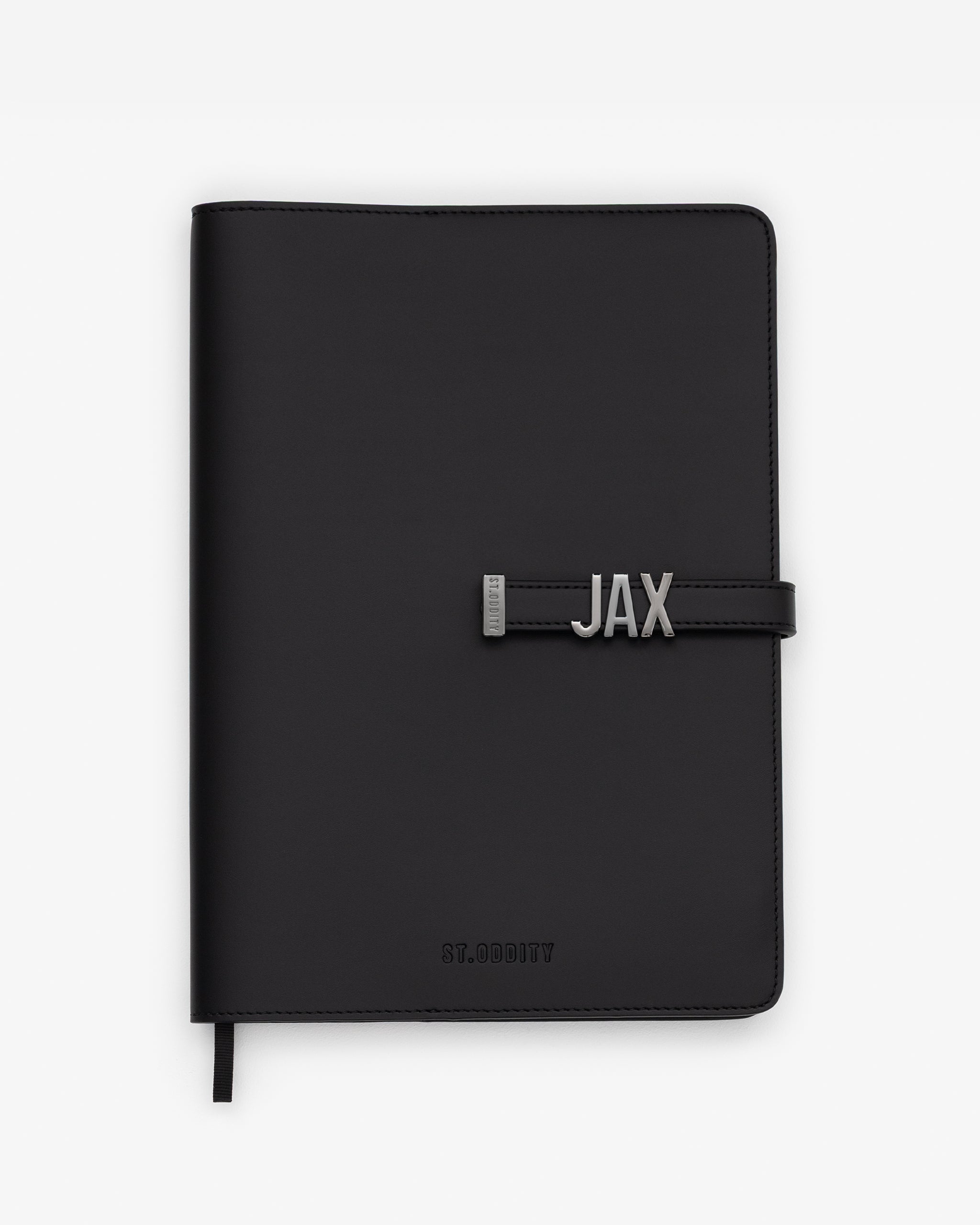 Black/Gunmetal A4 Notebook with 'JAX' gold personalisation on a white background.