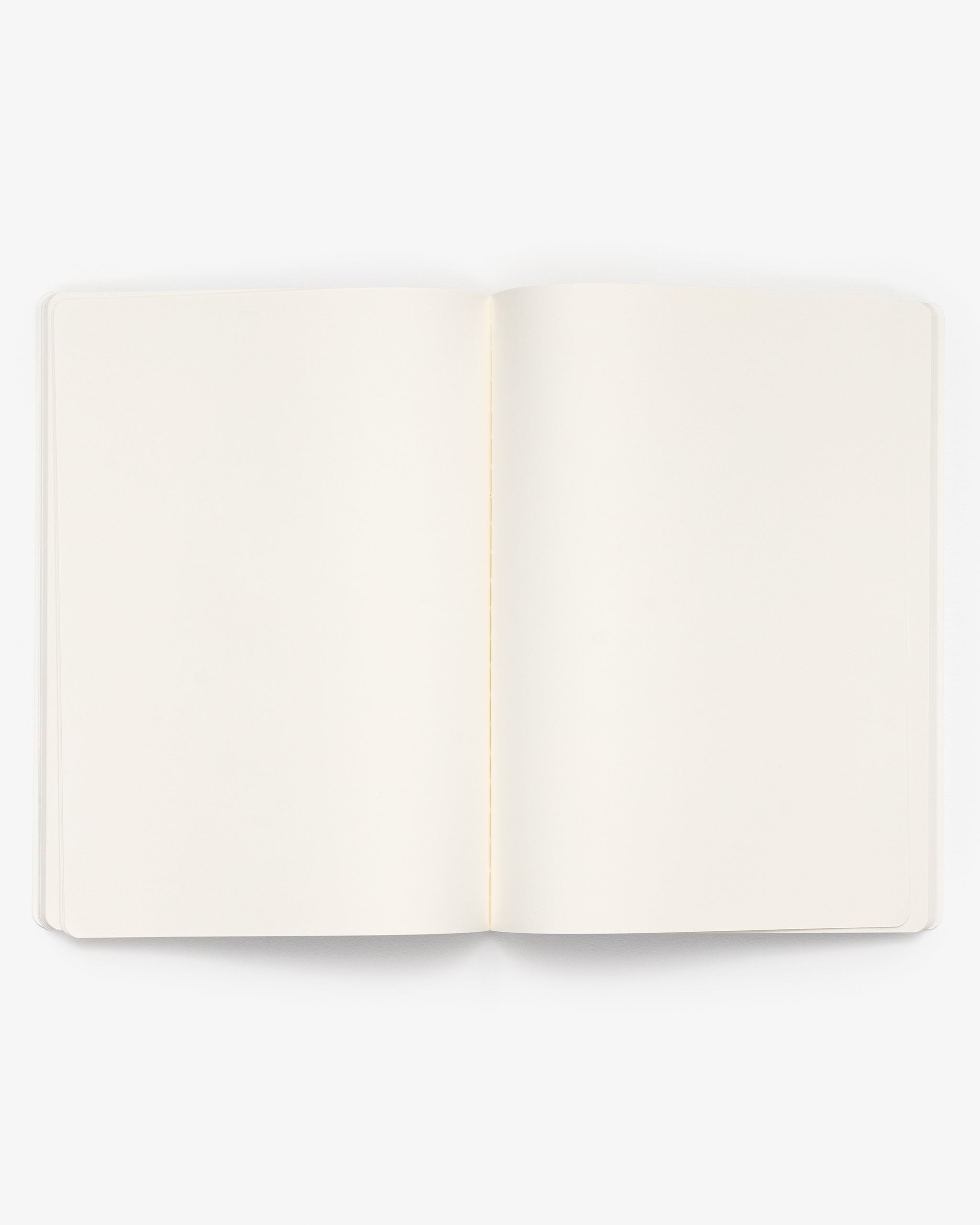 Open A4 notebook with blank pages on a white background