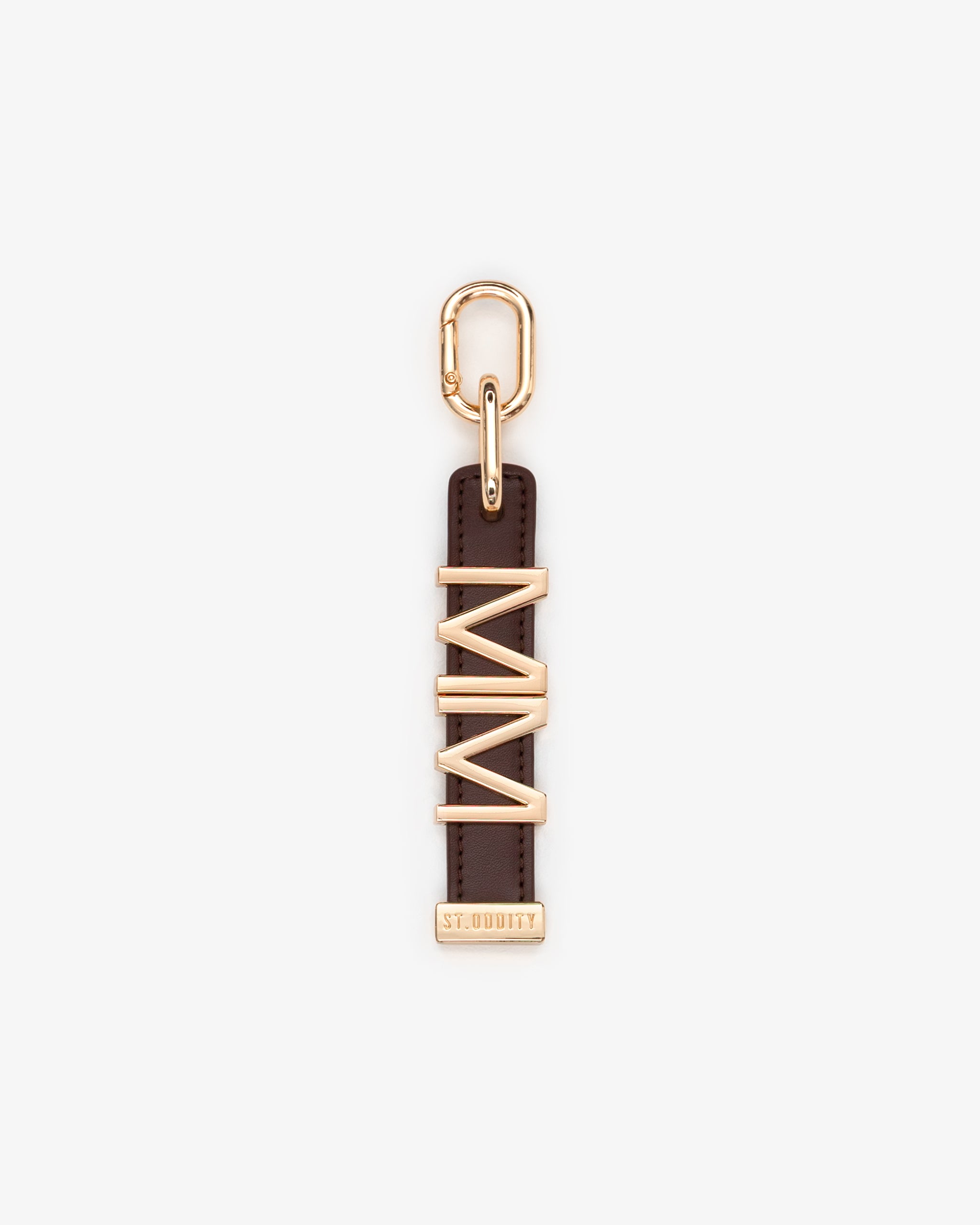 Brown charm with gold personalisation 'MM' on a white background