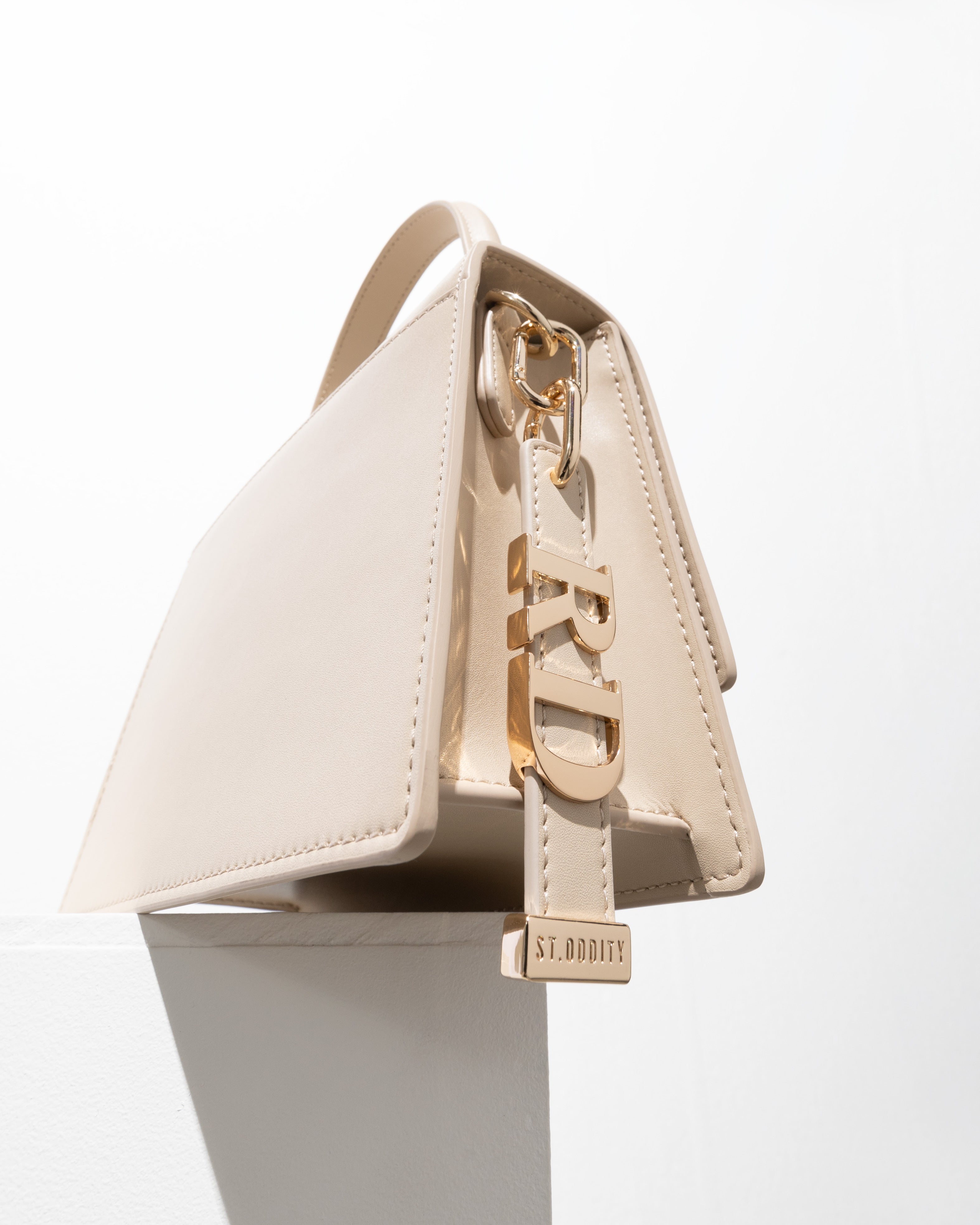 Charm in Light Sand with Personalised Hardware