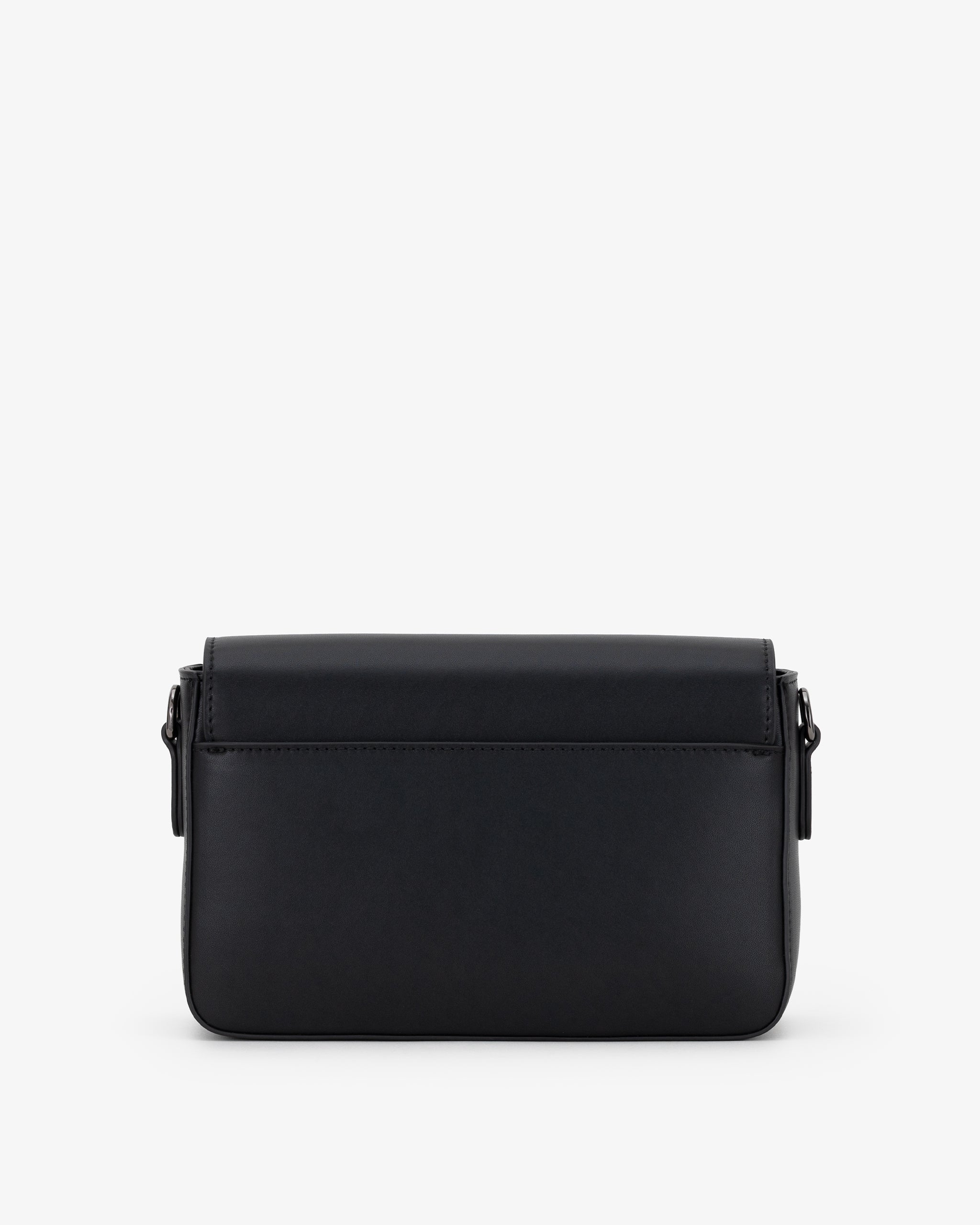 Back of black crossbody bag on a white background