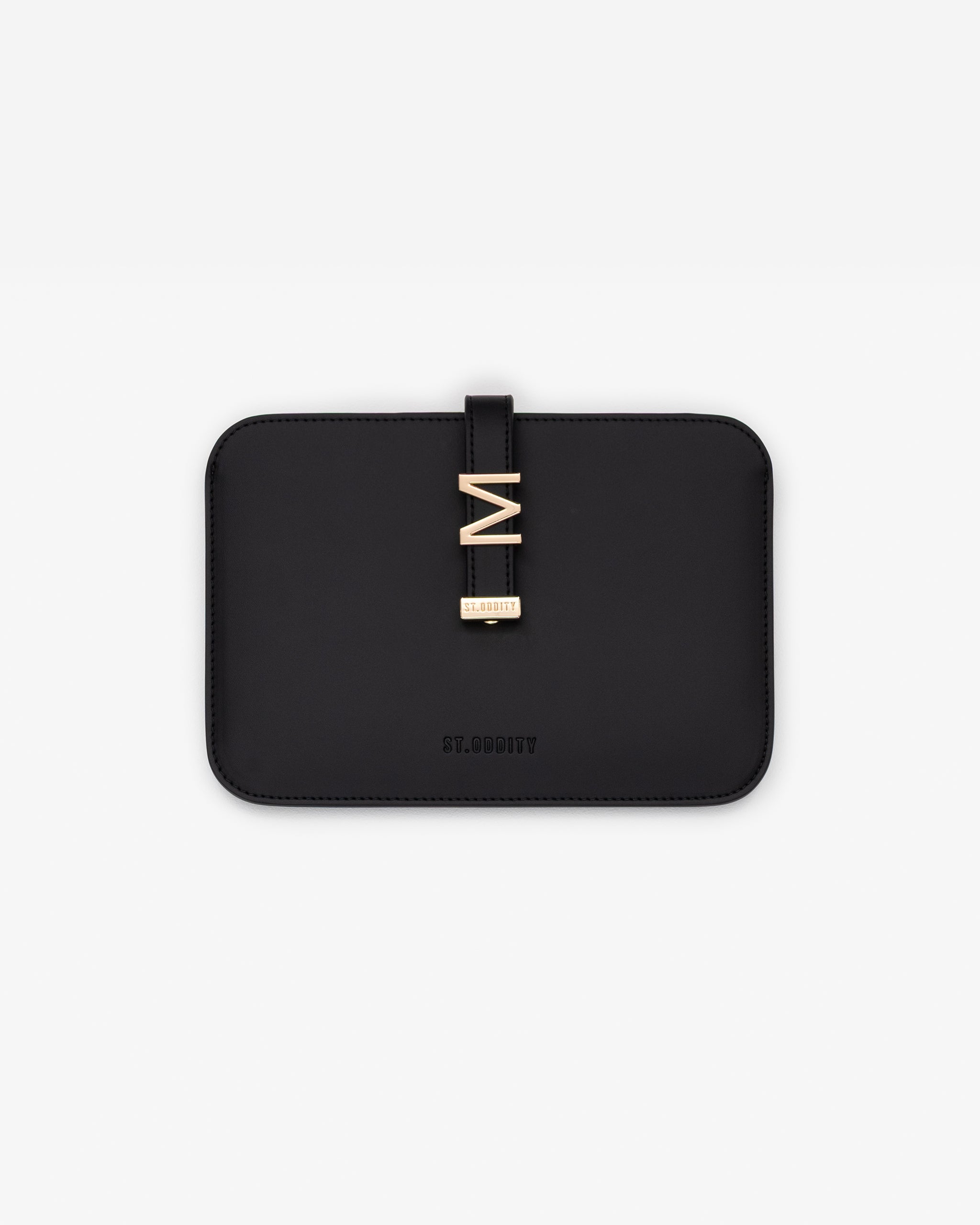Black iPad/kindle sleeve with gold personalisation 'M' on a white background