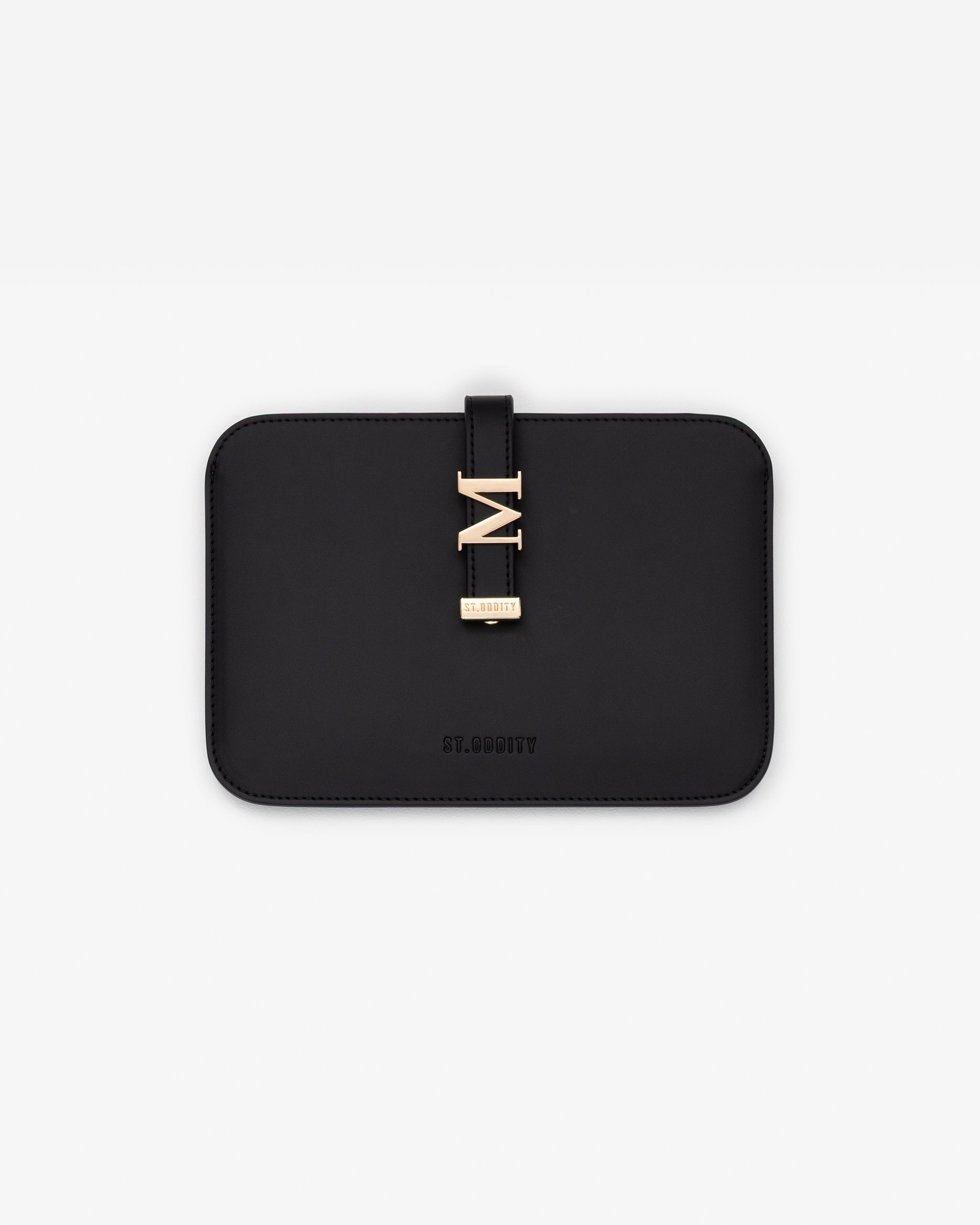 Black iPad/kindle sleeve with gold personalisation 'M' on a white background