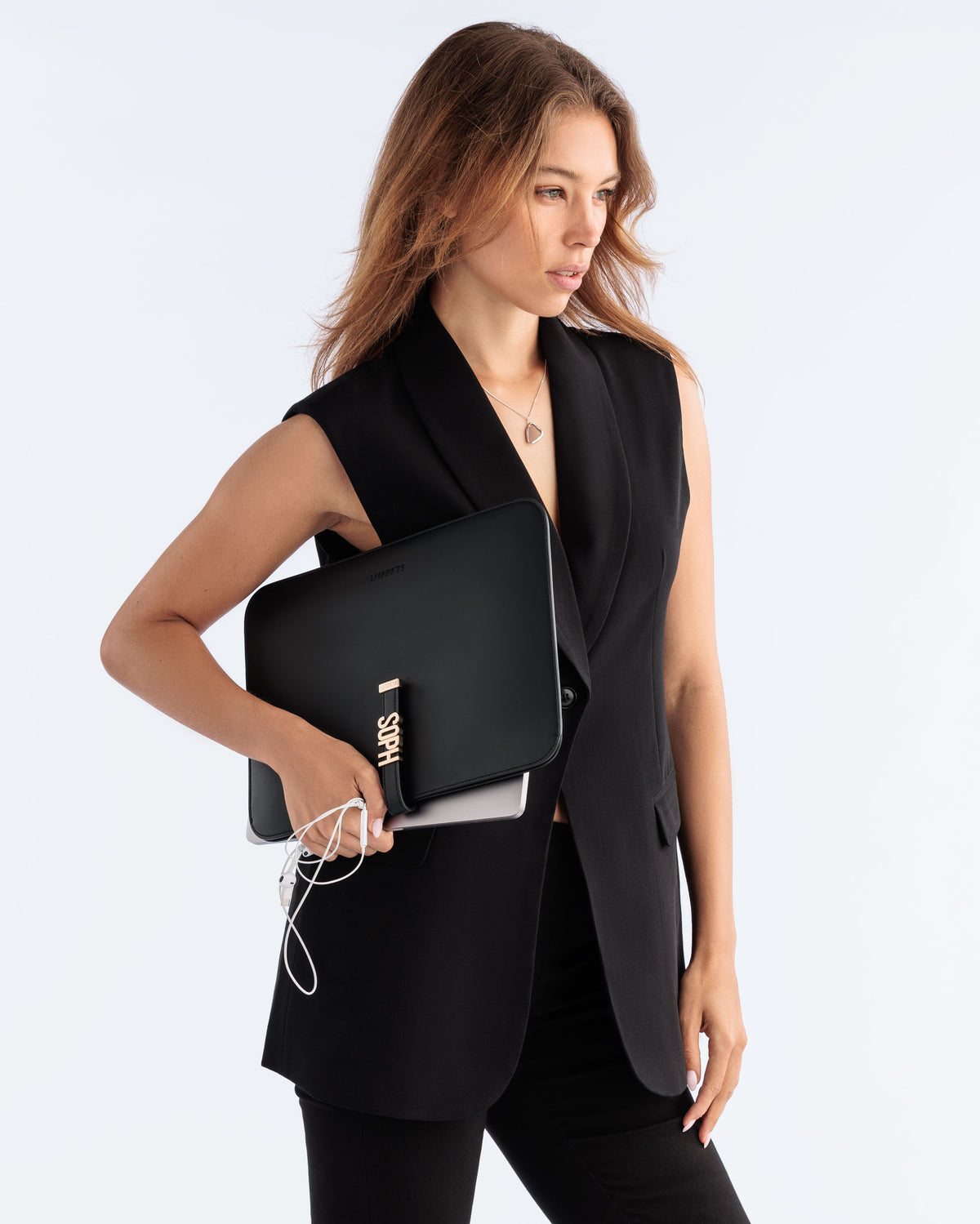 Model holding the Laptop Sleeve