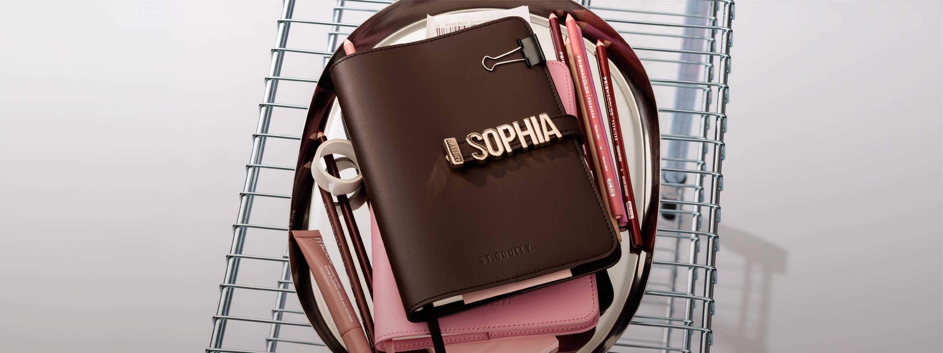 A5 Notebook in Brown with 'SOPHIA' in gold.