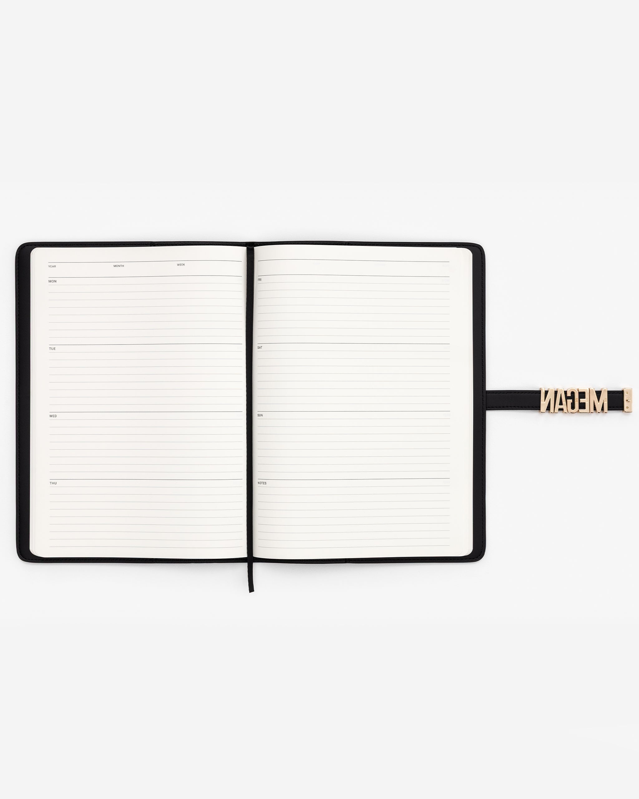 Open black notebook with lined pages on a white background