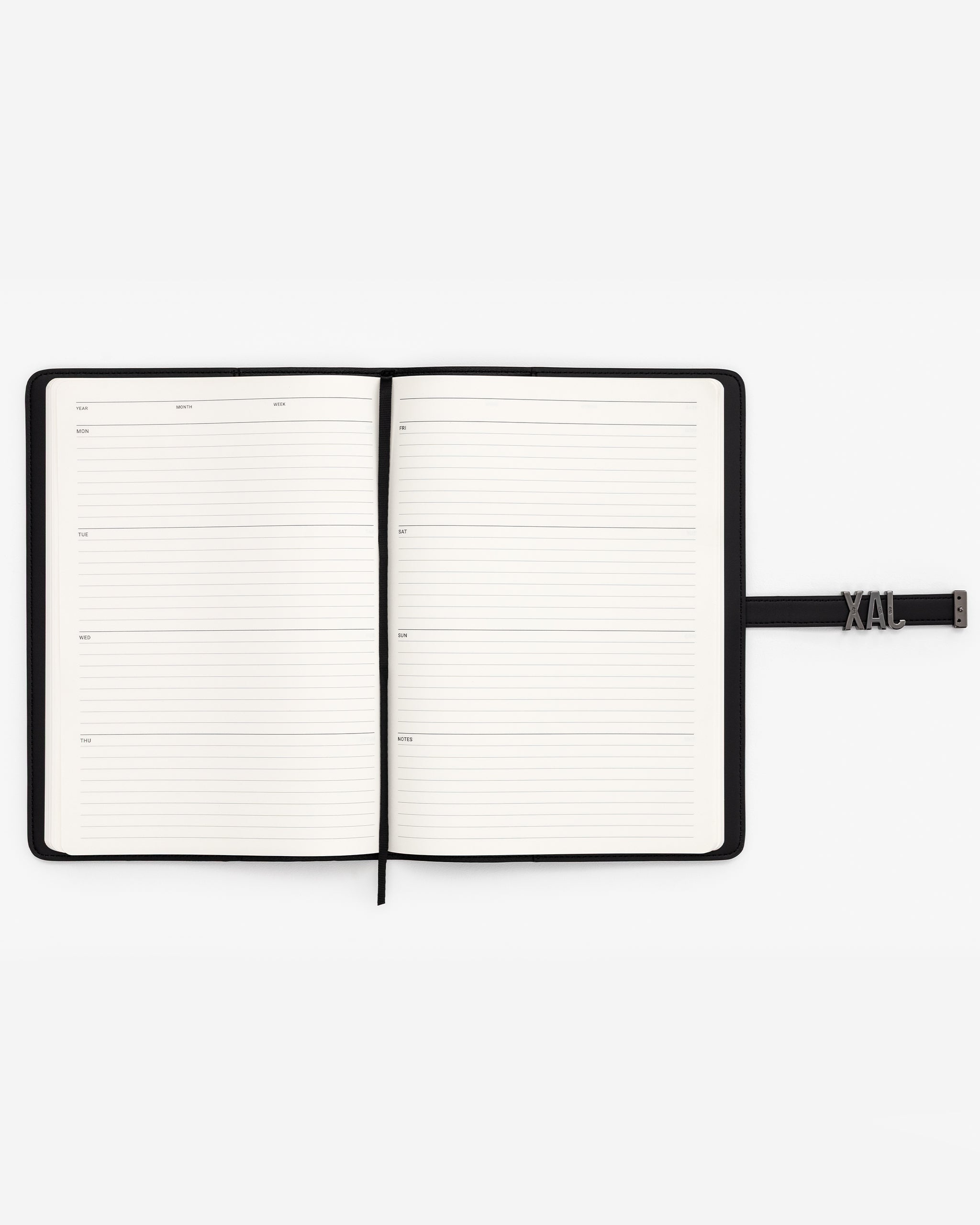 Open black A4 notebook with lined pages on a white background.