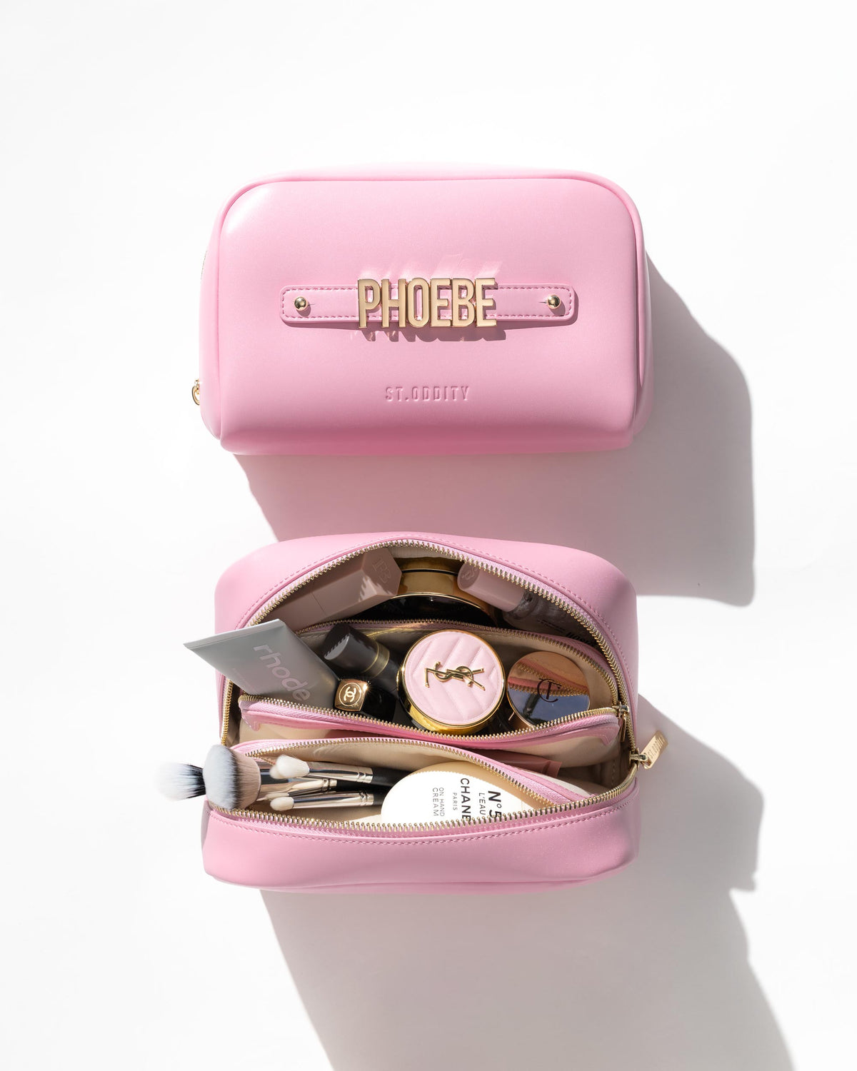 Cosmetic Pouch in Pink, open to show the interior