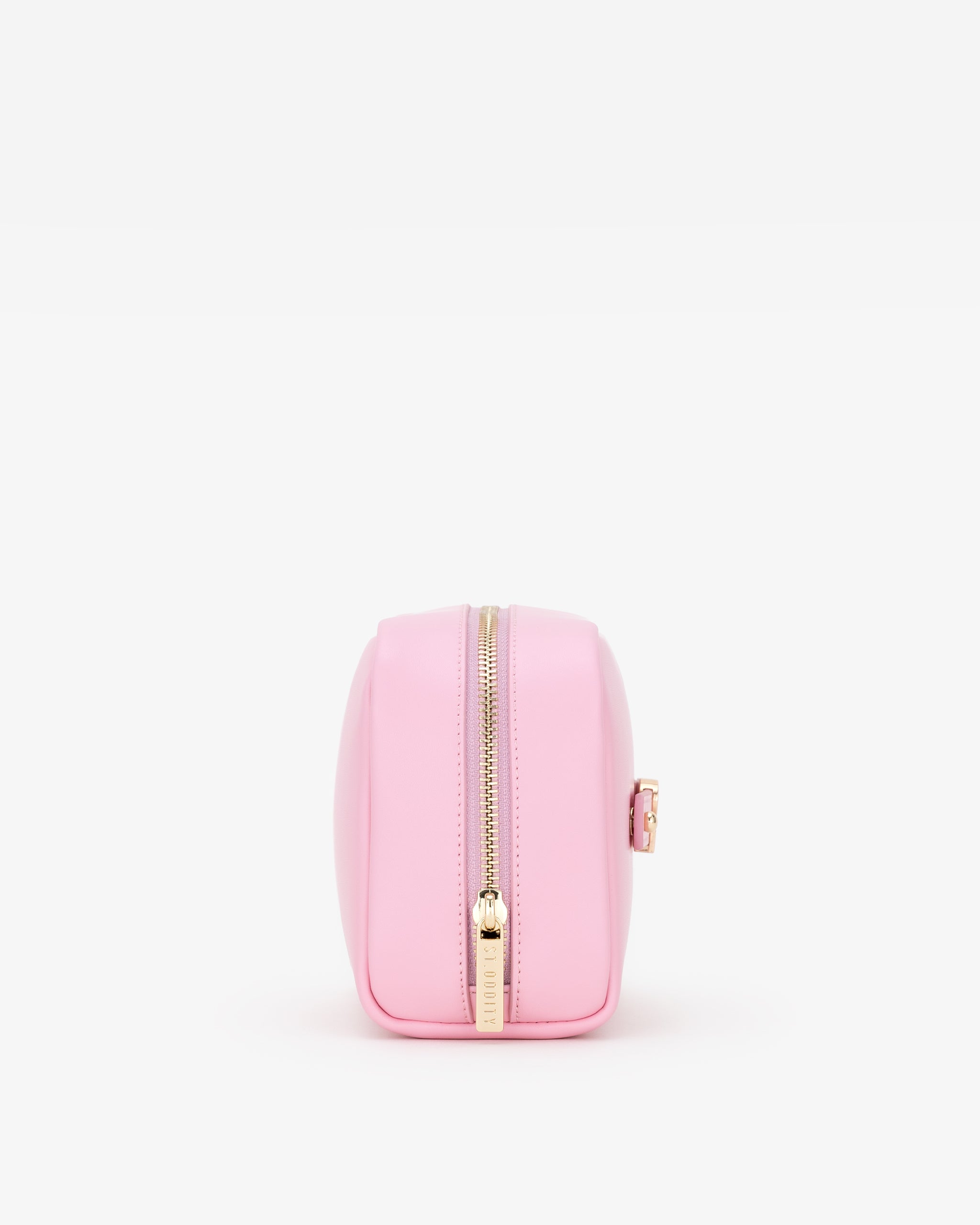 Pink round pouch with a gold zipper on a white background