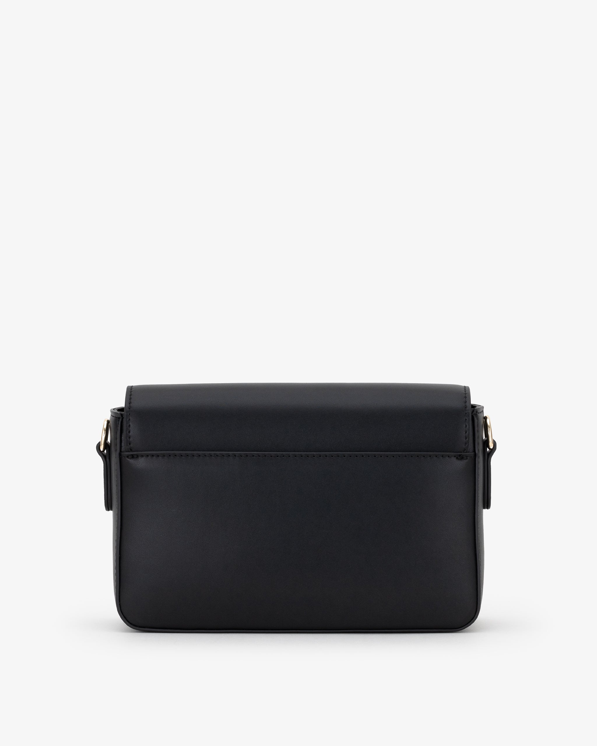 Back of black crossbody bag on a white background