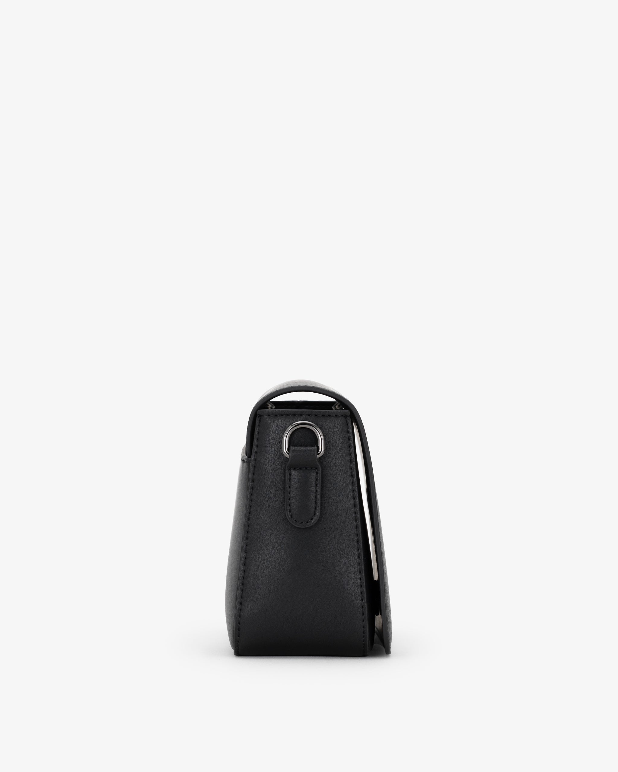 Side of black crossbody bag on a white background