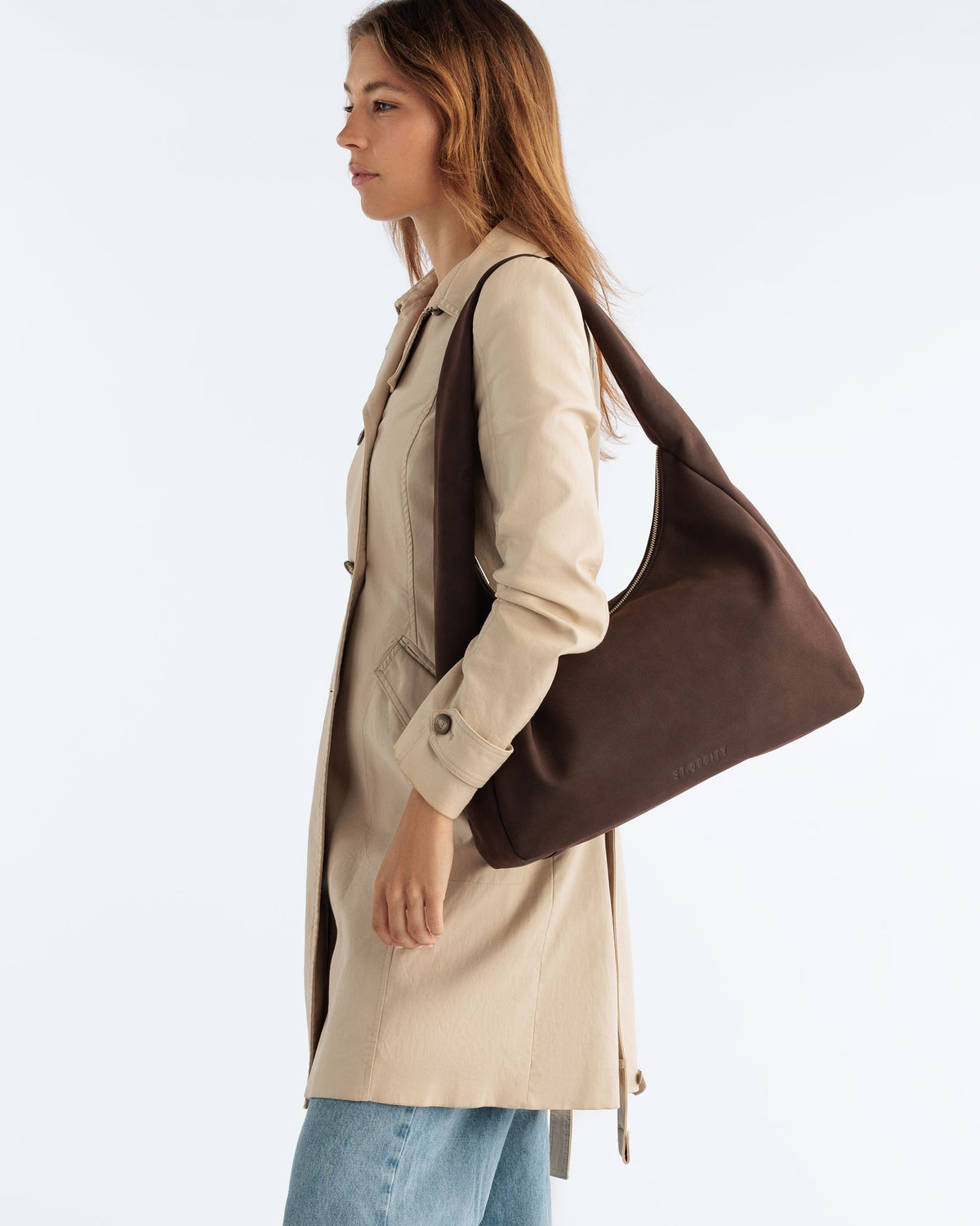 Model carrying the Hobo Bag in Brown