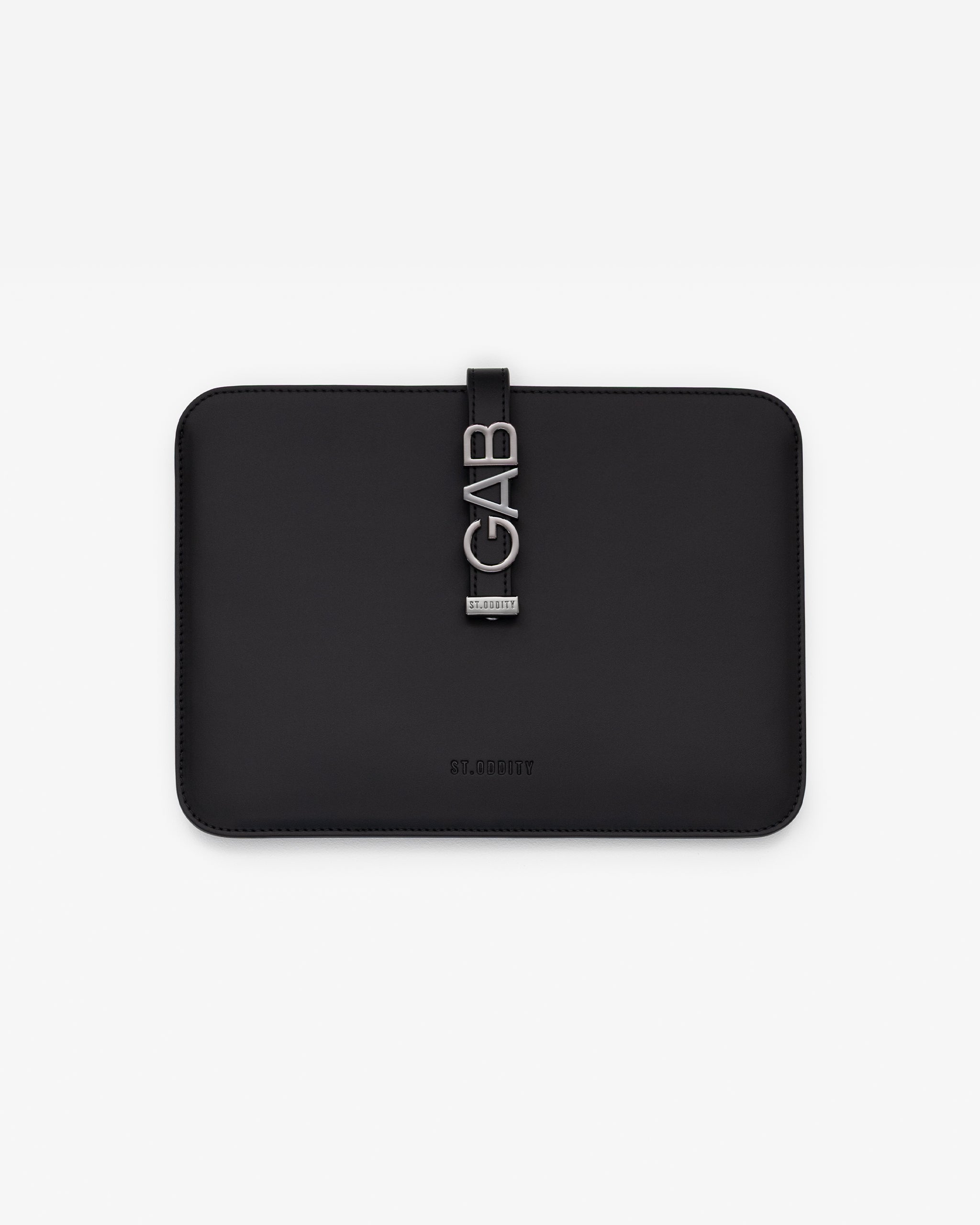 Black iPad sleeve with gunmetal personalisation 'GAB' on a white background