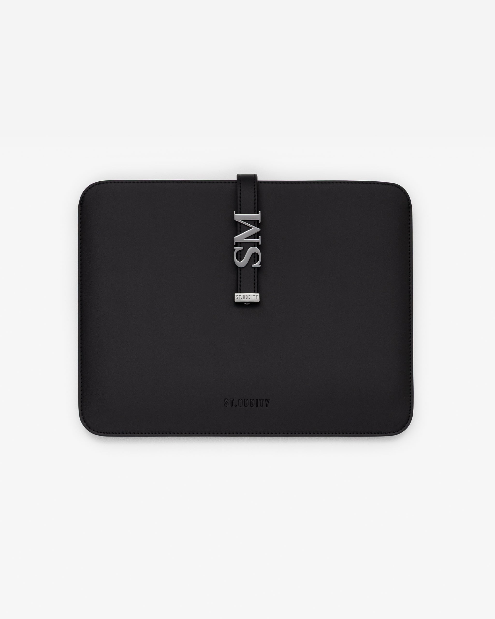 Black iPad sleeve with gunmetal personalisation 'SM' on a white background