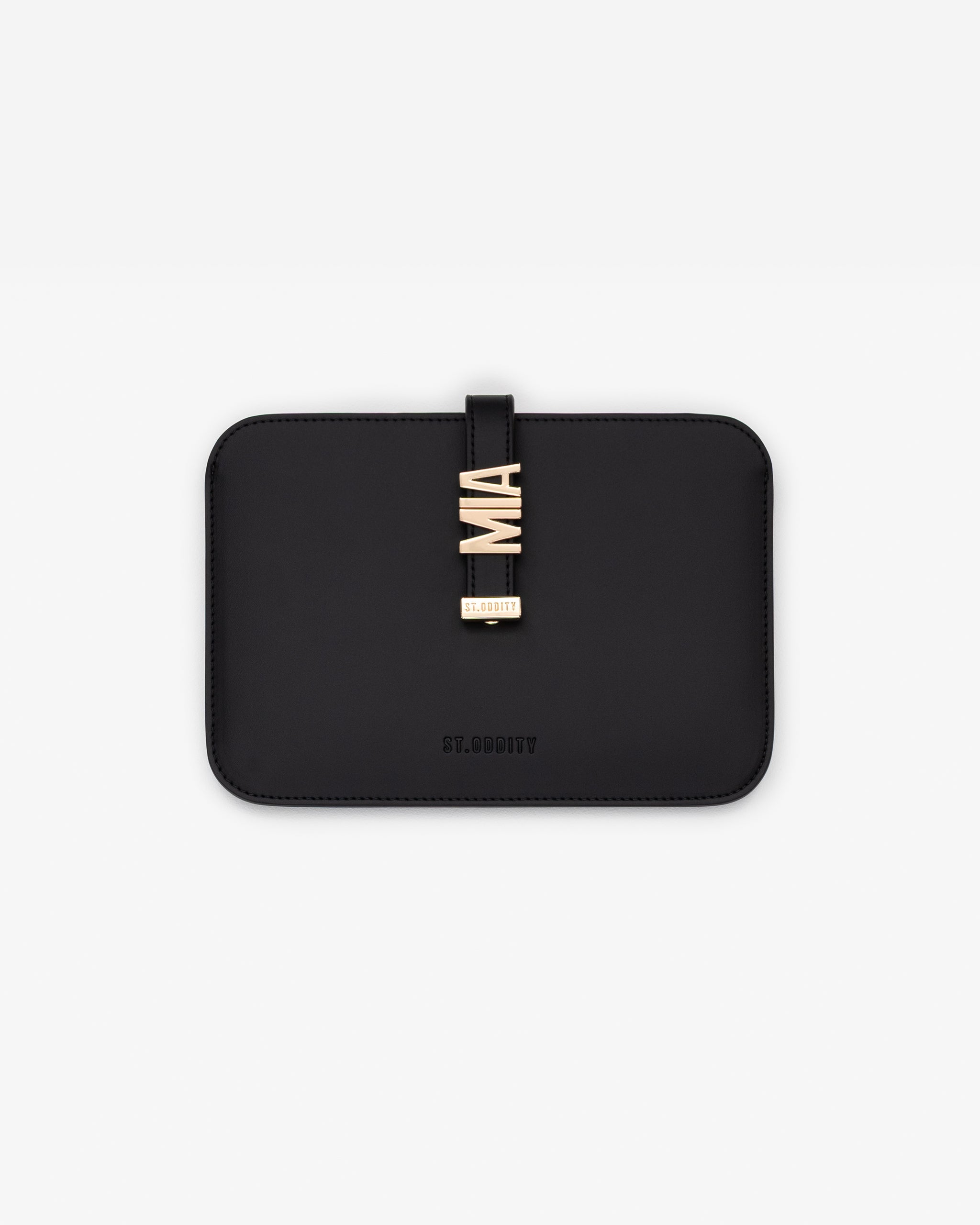 Black iPad/kindle sleeve with gold personalisation 'MIA' on a white background