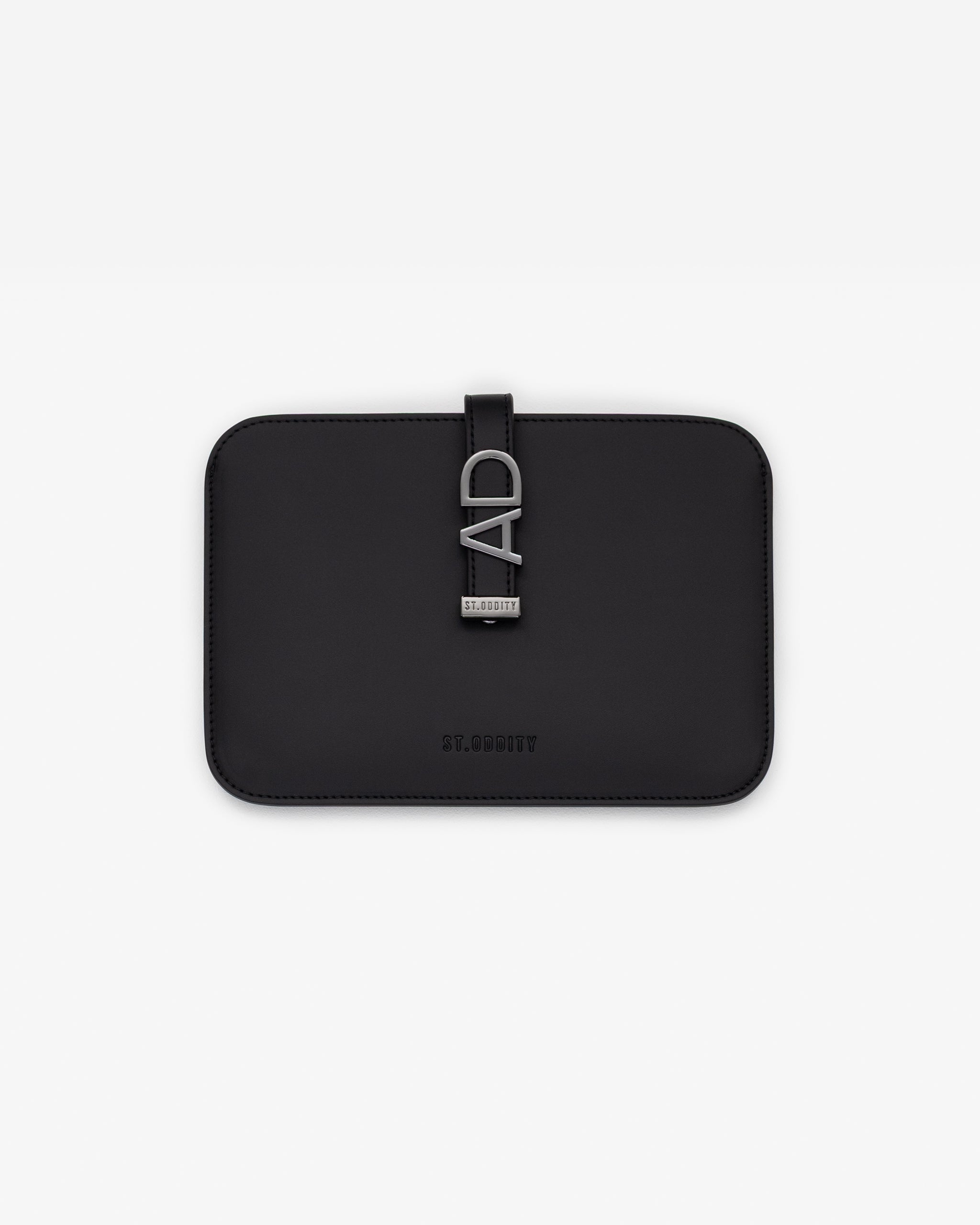 Black iPad/kindle sleeve with gunmetal personalisation 'AD' on a white background