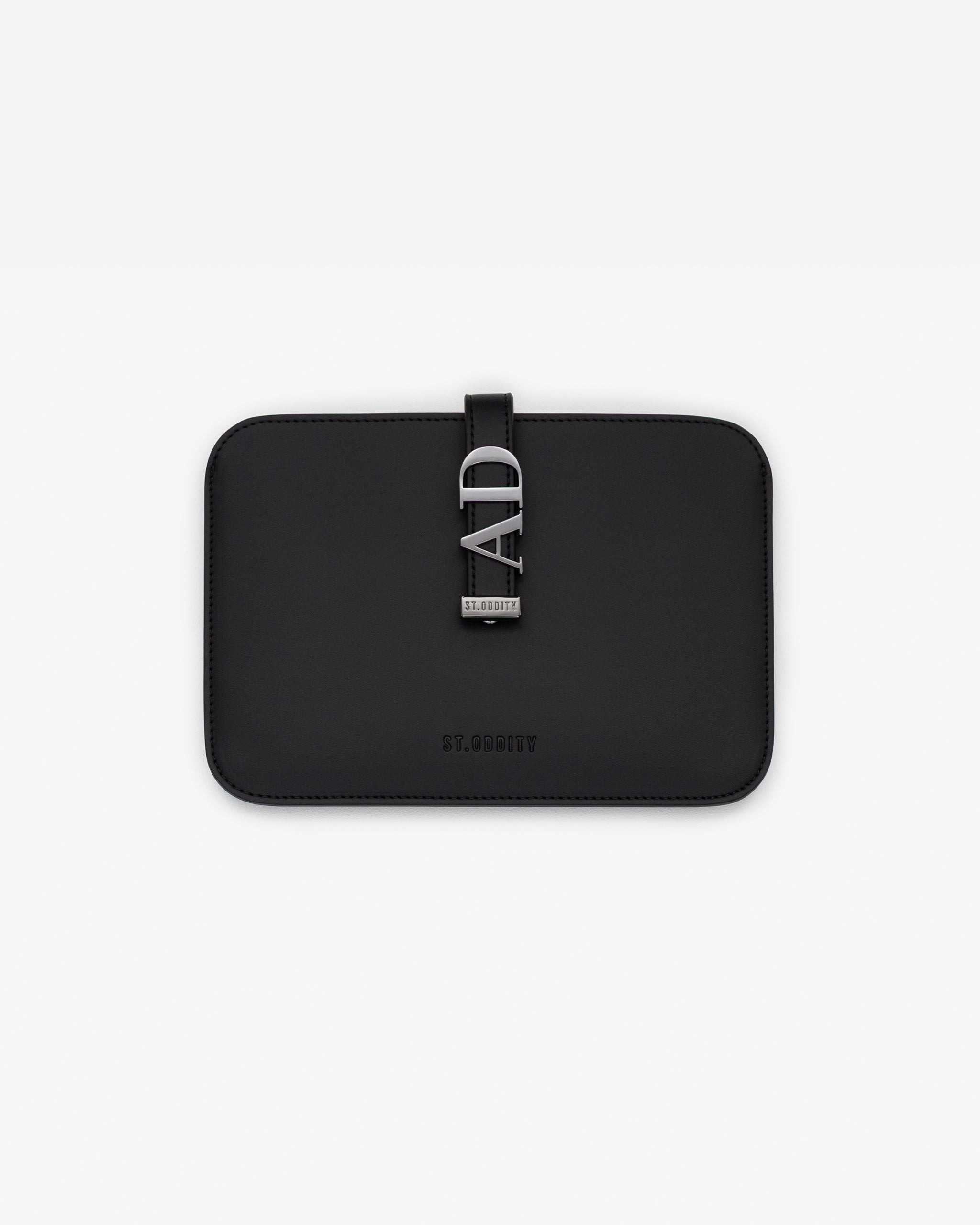 Black iPad/kindle sleeve with gunmetal personalisation on a white background