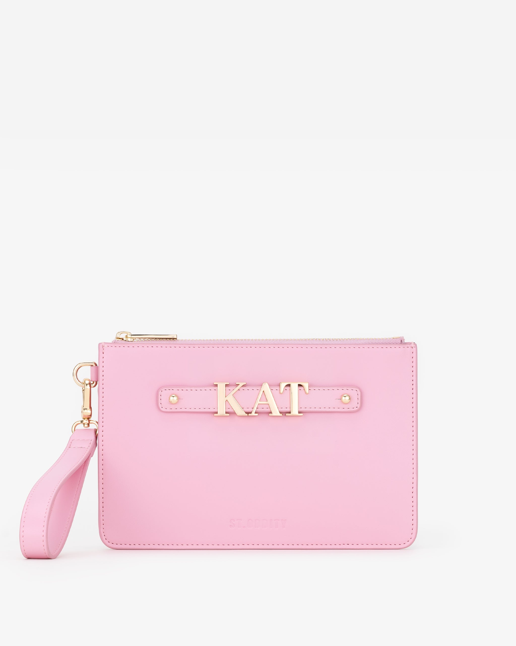 Pink pouch with gold personalisation 'KAT' on a white background