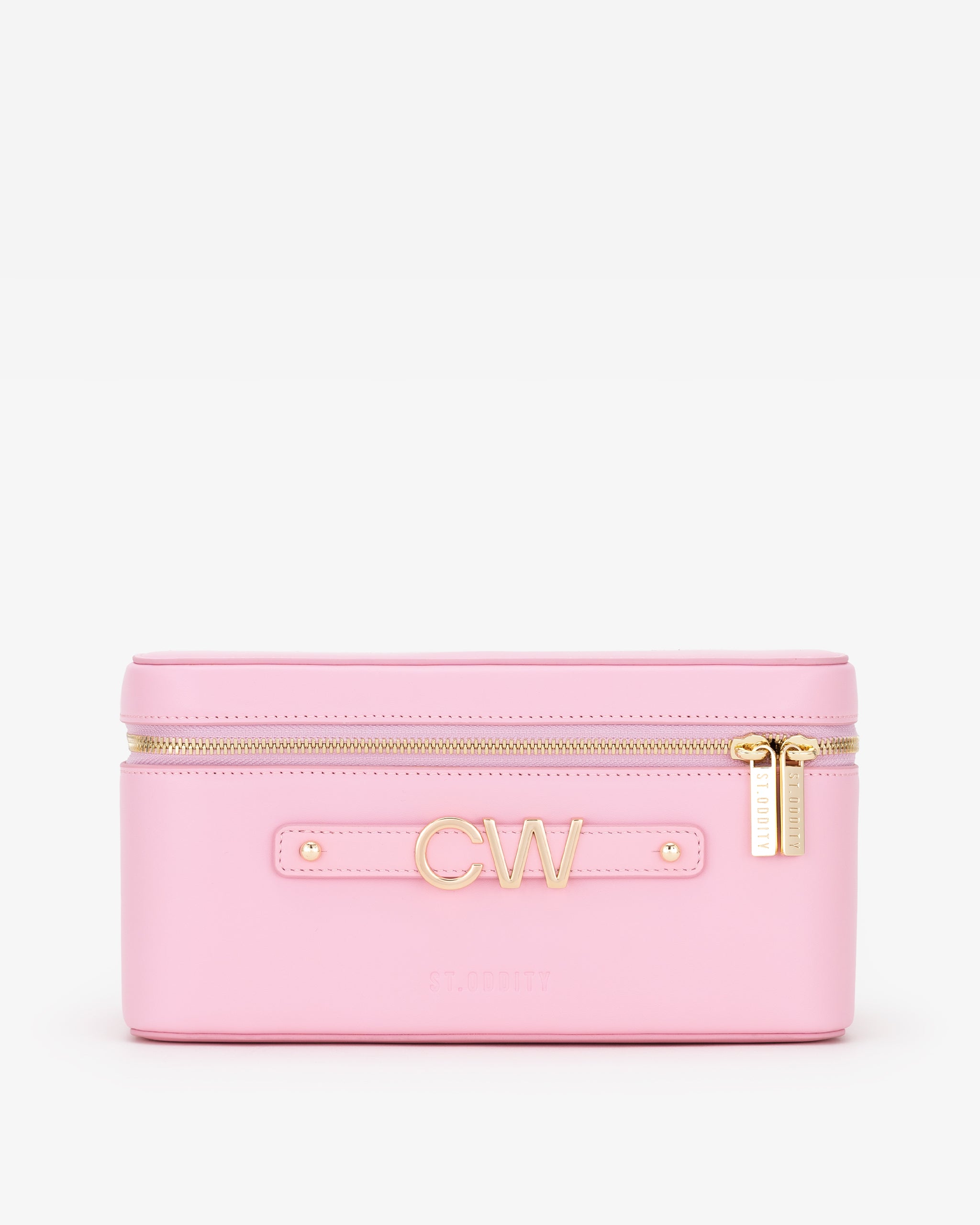 Pink makeup bag with initials 'CW' on a white background