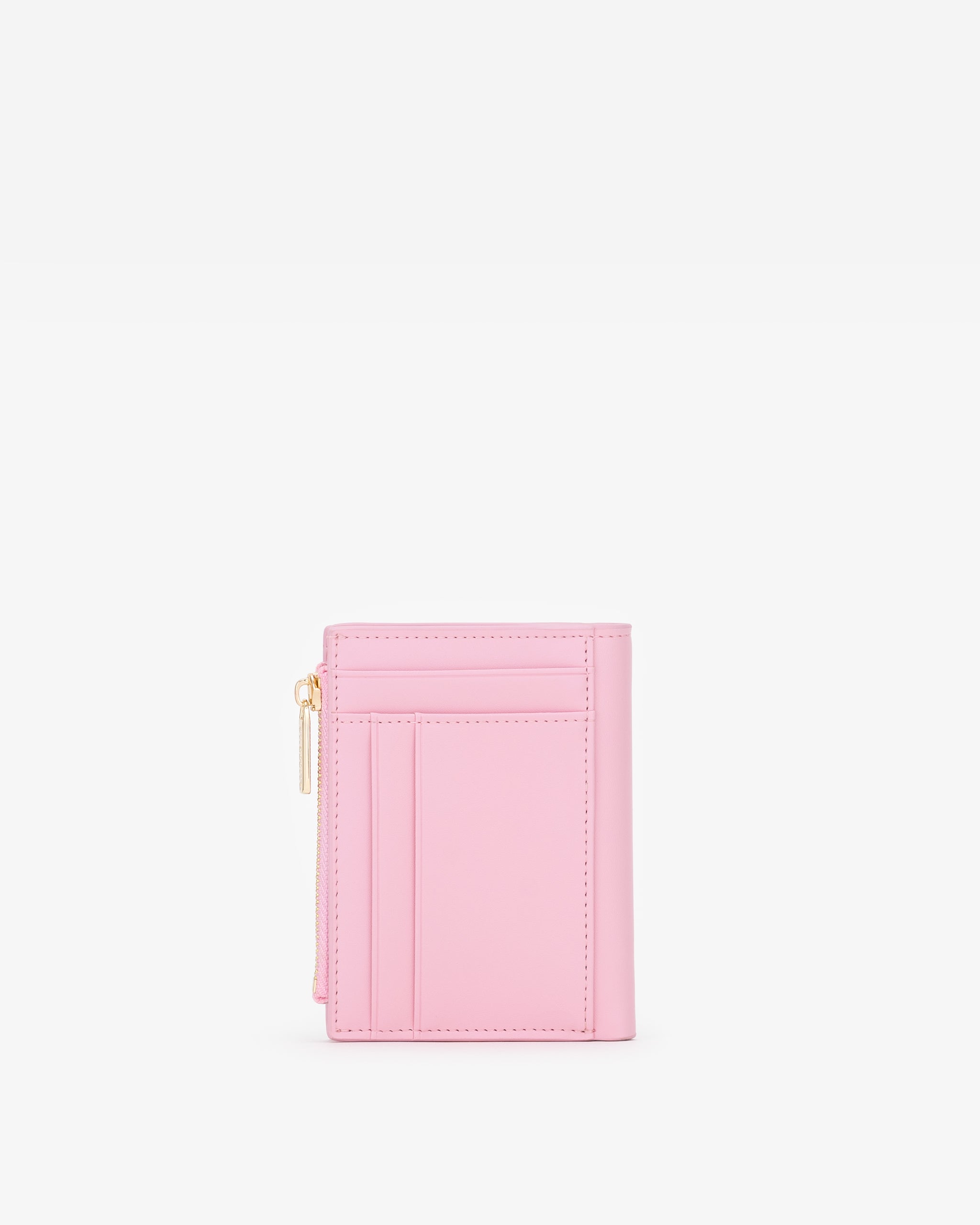Pink wallet with multiple card slots on a white background